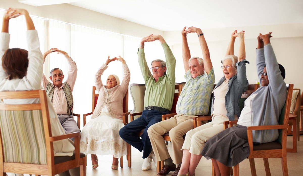 Residents doing group stretches