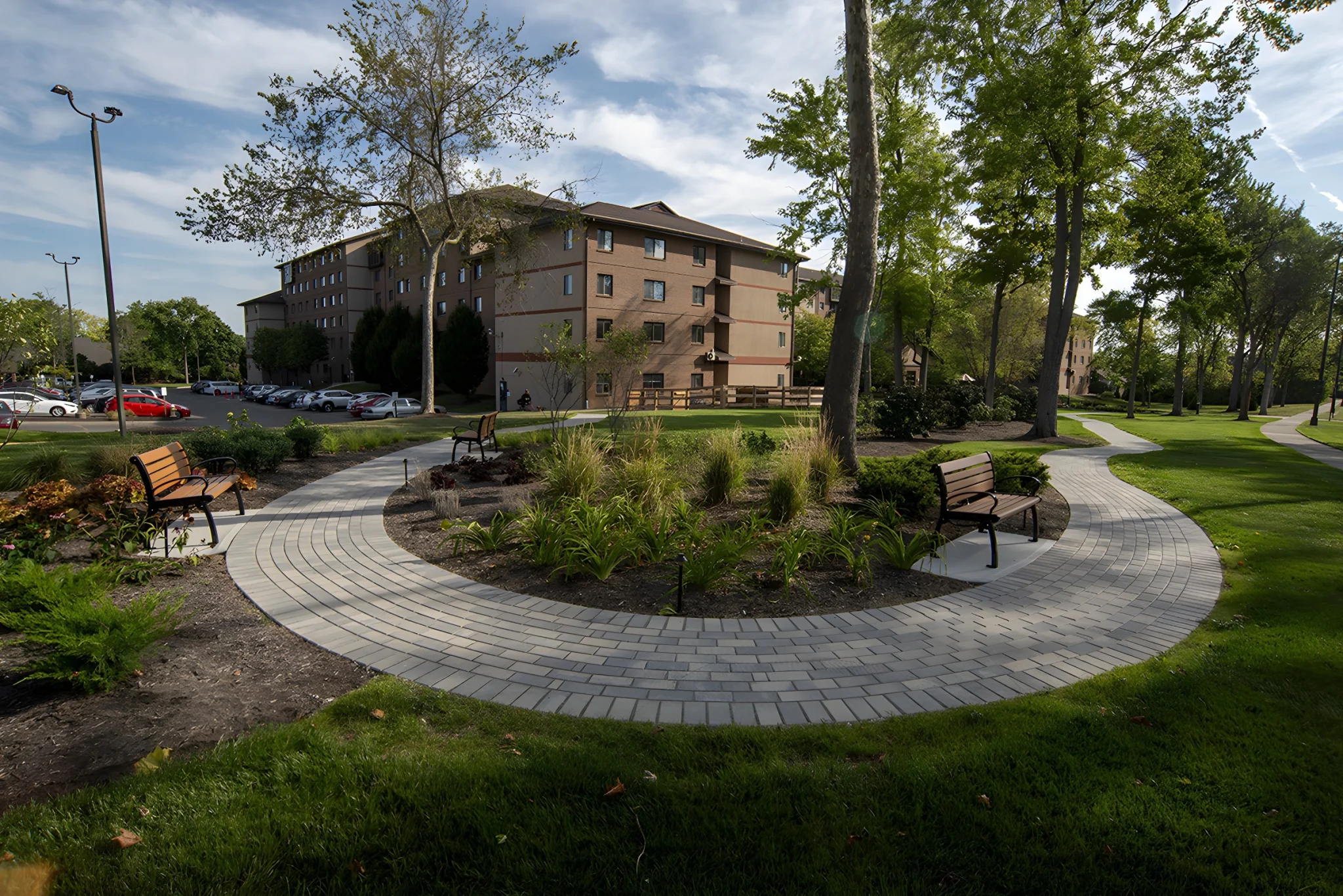 Scenic outdoor walking path at One Lincoln Park senior living community in Dayton, Ohio.